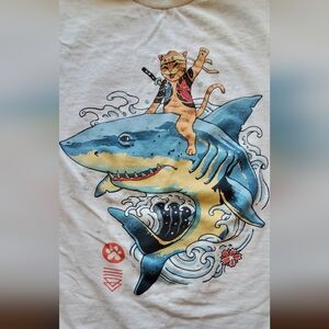 Threadless graphic t-shirt design by Vincent Trinidad, size small